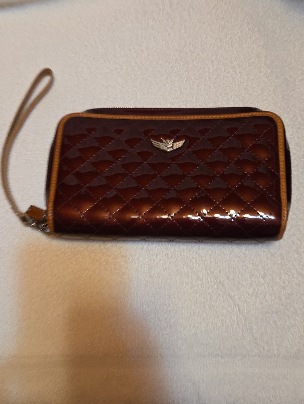 Consuela Quilted Patent Wristlet in Brown with Tan Trim